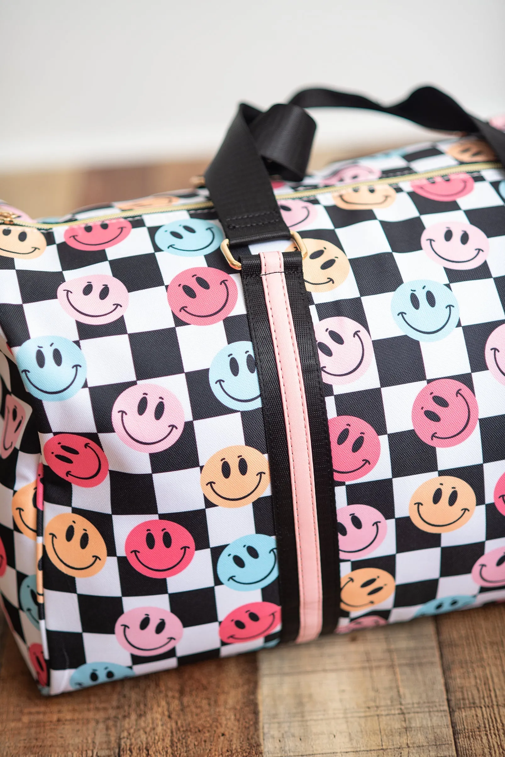 CHECKERED SMILEY OVERNIGHT BAG