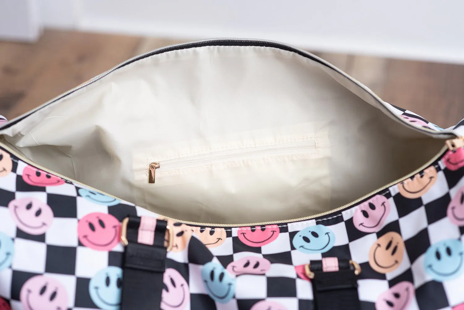CHECKERED SMILEY OVERNIGHT BAG