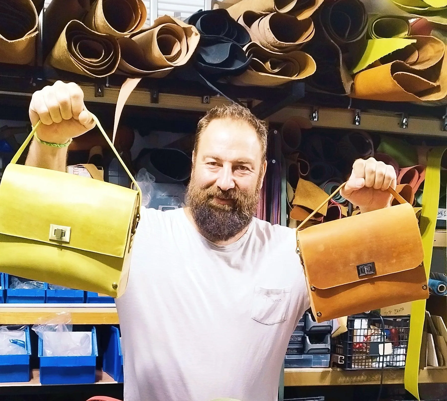 Orange oil leather top handle bag and olive treee wood